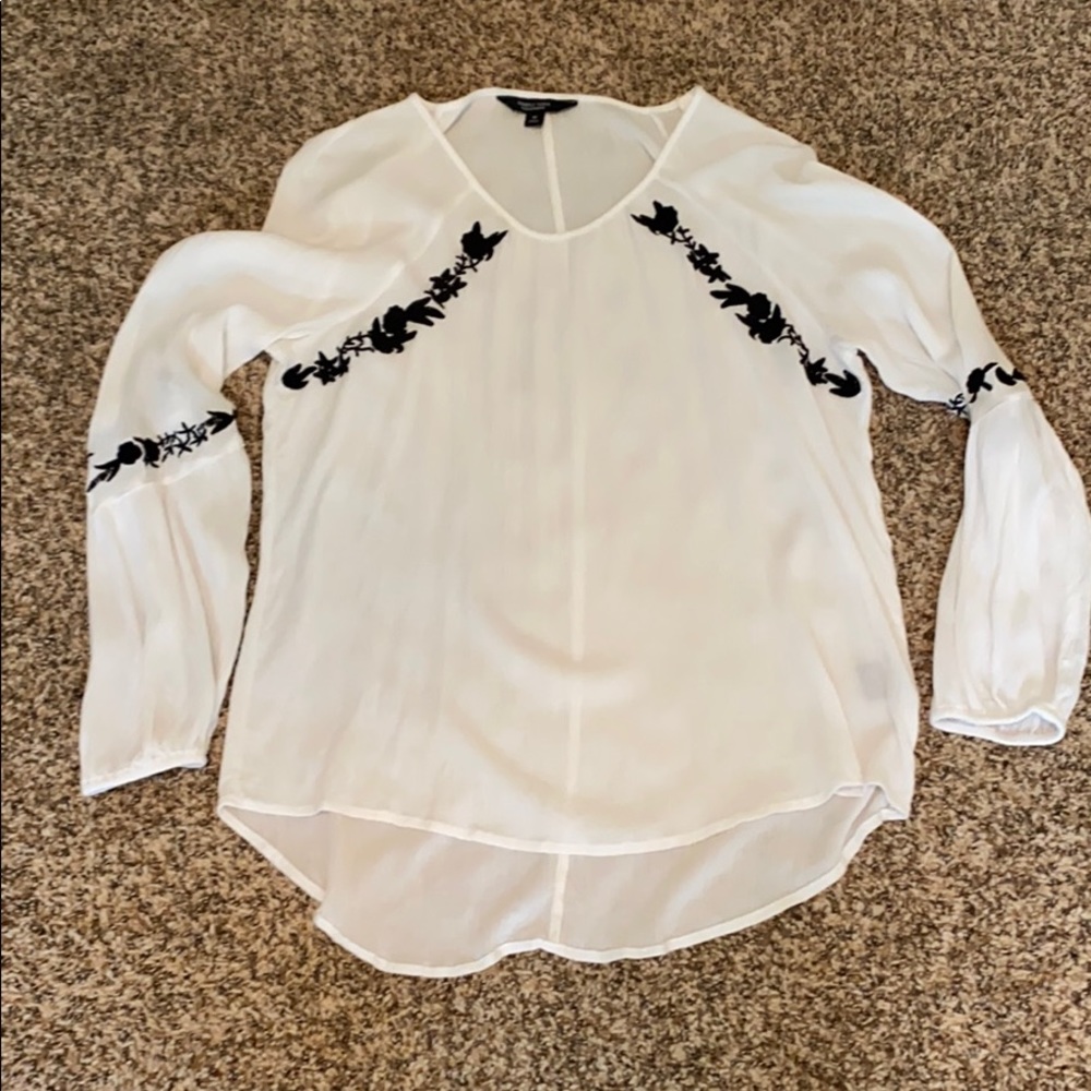 White blouse with navy/black embroidery